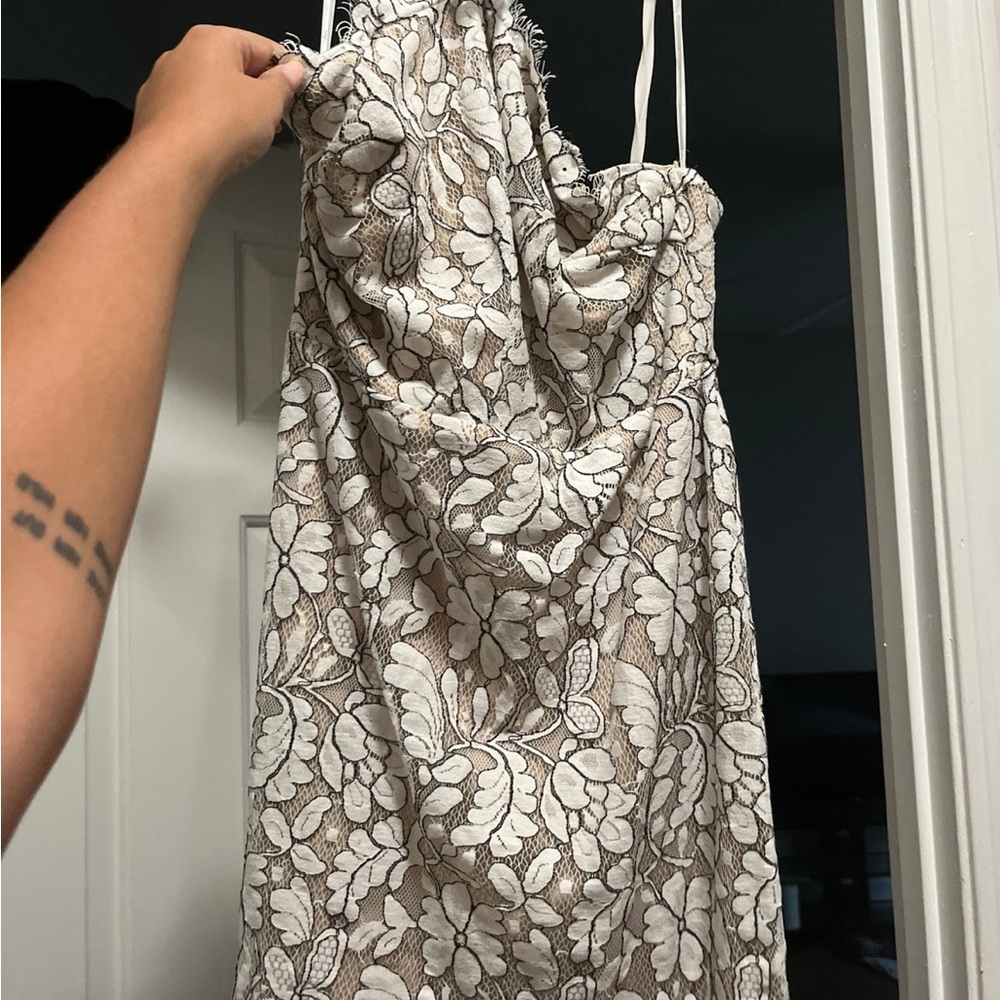 White, lace mini dress. Perfect for graduation or bridal dress